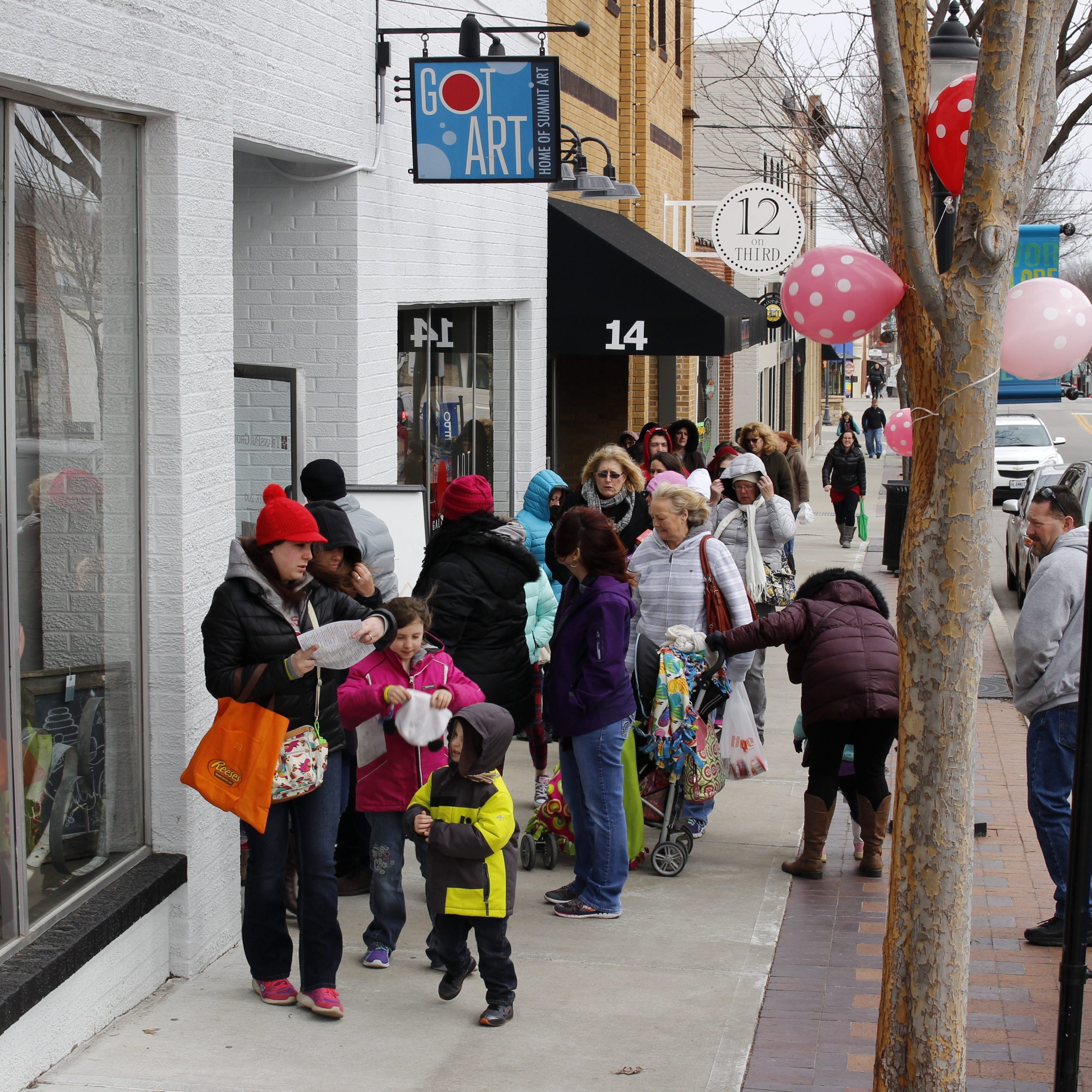 Community members lining up to support Downtown Lee's Summit through financial contributions.