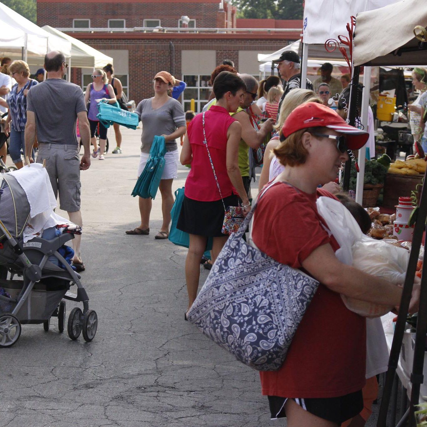 The bustling Farmers Market in Downtown Lee's Summit - a testament to local business success and community involvement.